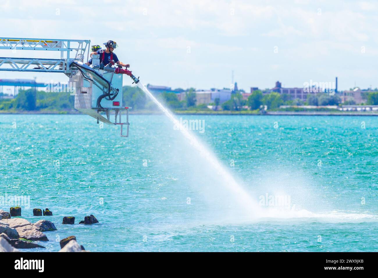 Windsor Fire and Rescue conduct fire training drills on the Detroit River, which separates the cities of Windsor, Ontario, Canada from Detroit, Michig Stock Photo