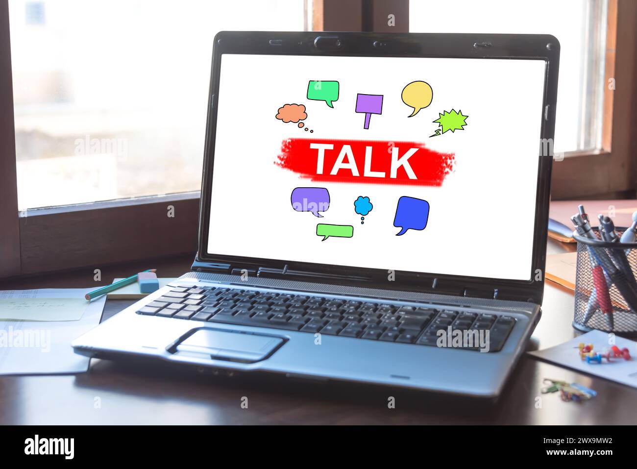 Laptop screen displaying a talk concept Stock Photo