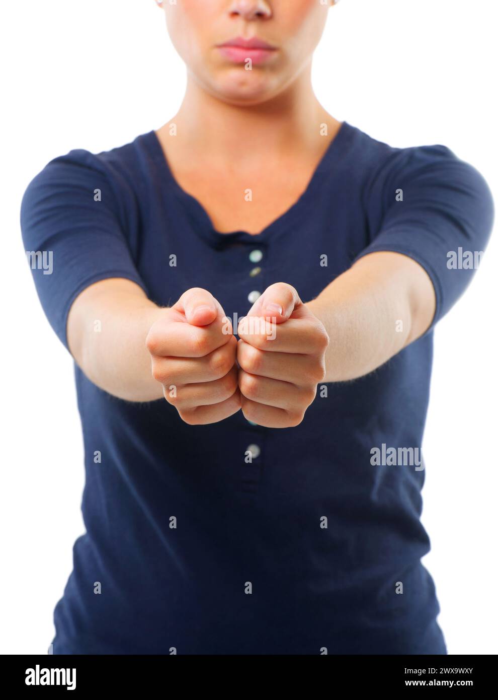 Woman, arms together and studio for handcuff, criminal and guilty for arrested, crime and illegal. Young person and isolated with hand forward for Stock Photo