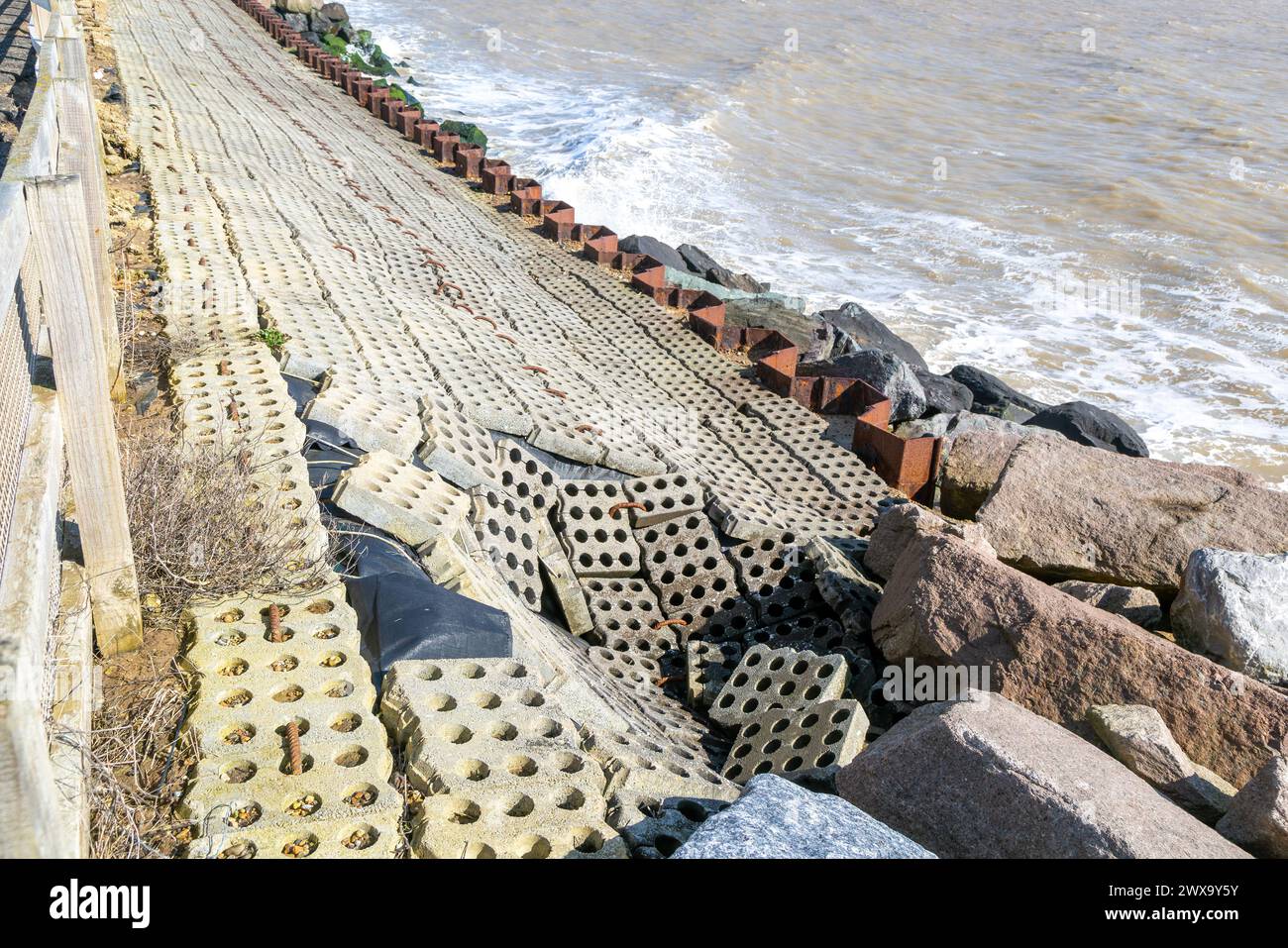 Coastal defences North Sea coast at East Lane, Bawdsey, Suffolk, England, UK showing some damage Stock Photo