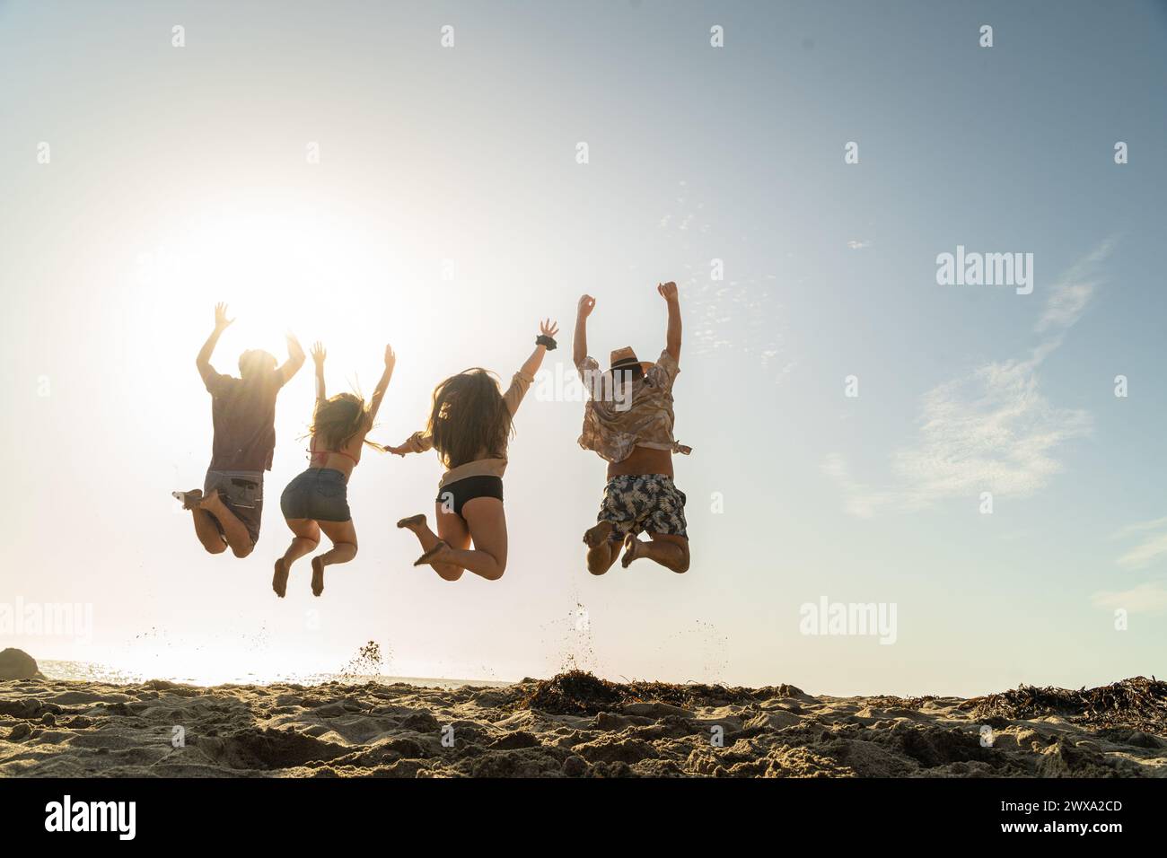 Four energetic young individuals hi-res stock photography and images ...