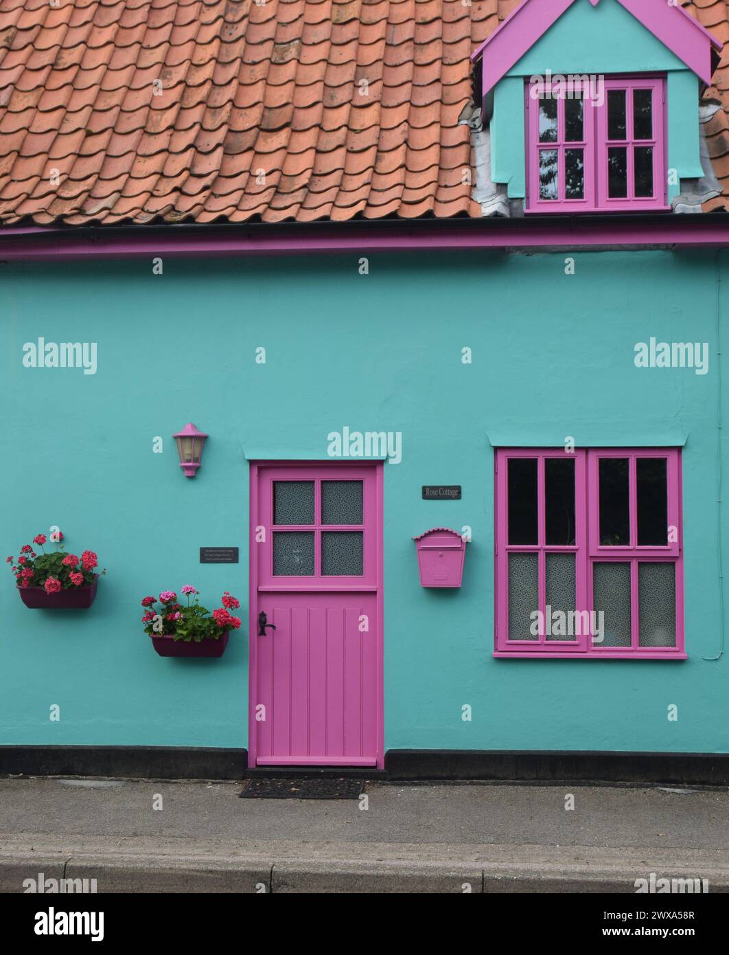 brightly painted house exterior Stock Photo Alamy