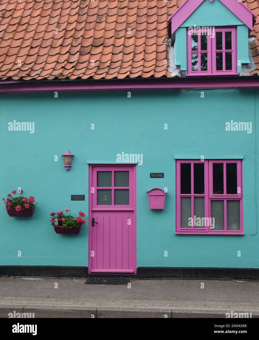 brightly painted house exterior Stock Photo