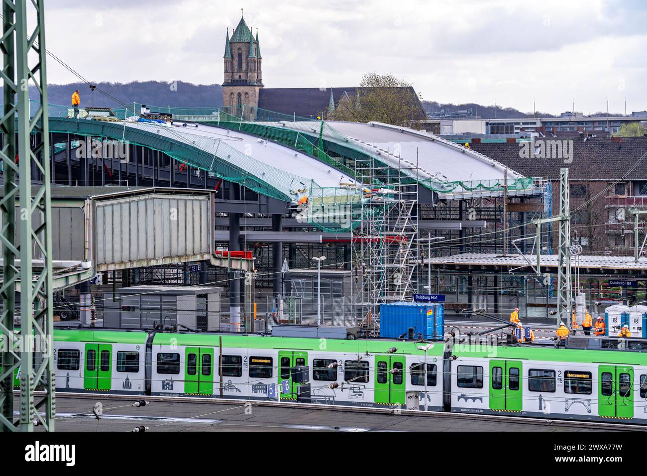 Modernization of Duisburg Central Station, the platforms of the 13 tracks are being renewed, the old flat roofs are being replaced by corrugated steel Stock Photo