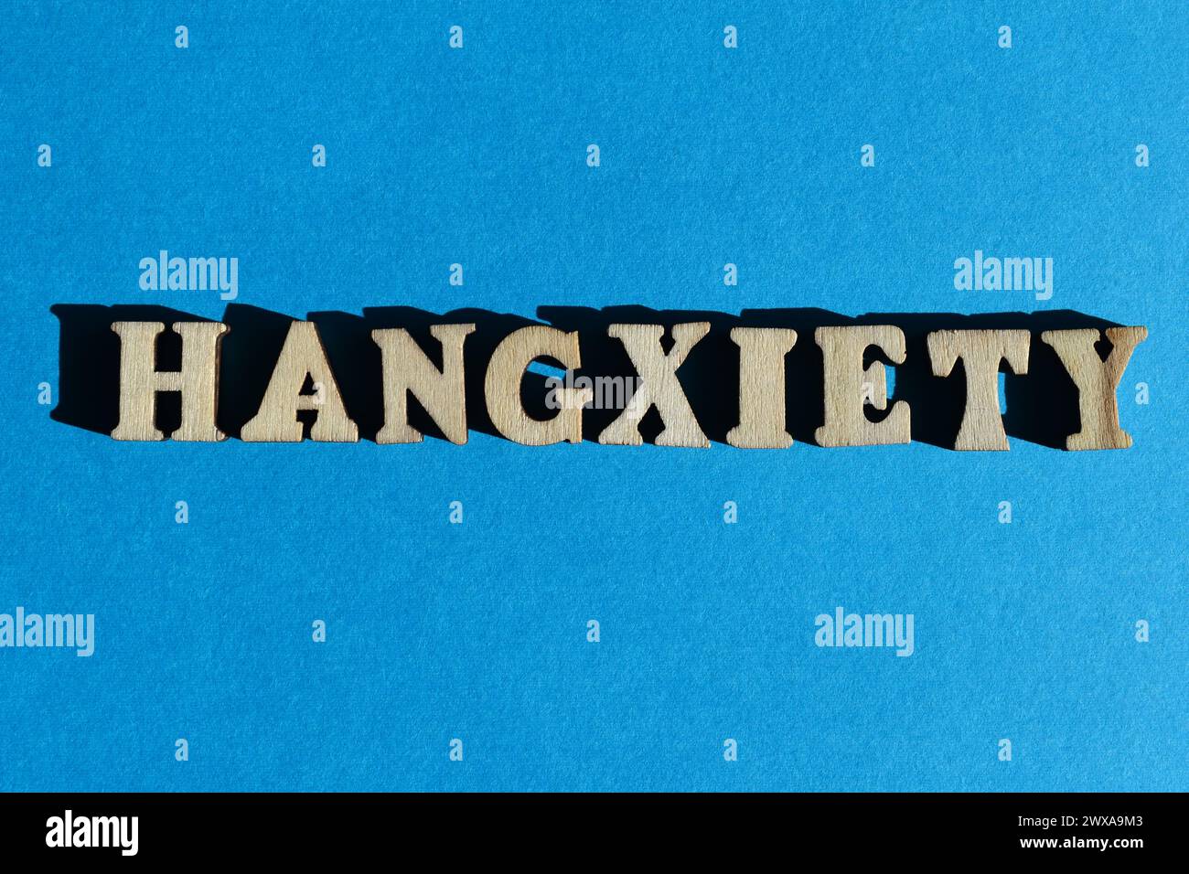 Hangxiety, portmanteau word of hangover and anxiety. The feeling of being anxious or overwhelmed after drinking too much alcohol Stock Photo