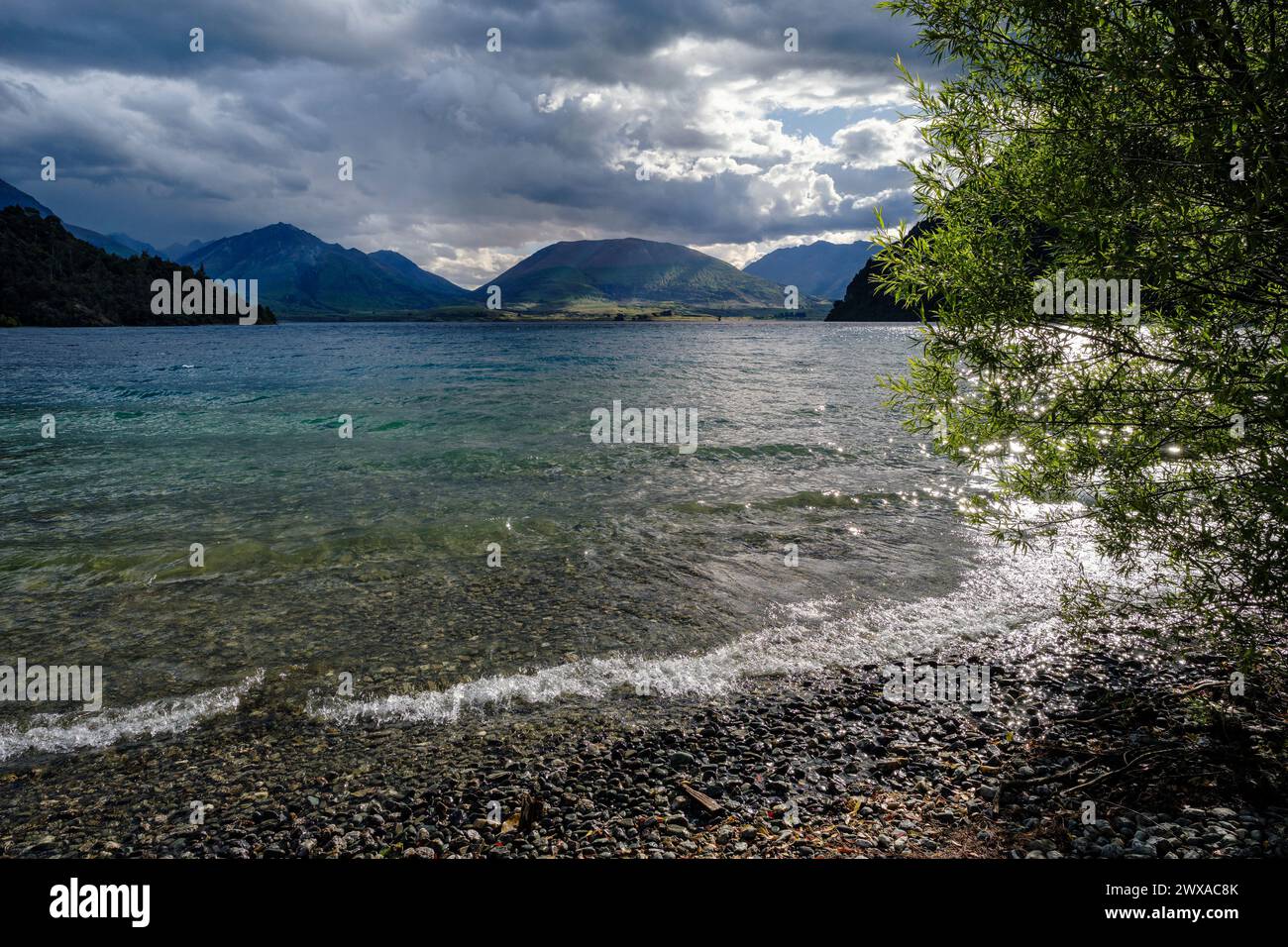 A stormy sky at Bobs Cove, Lake Wakatipu, Otago, South Island, New ...