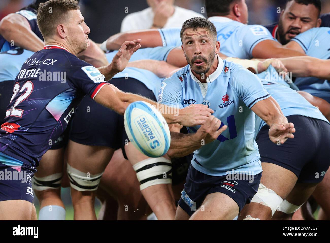 SYDNEY, AUSTRALIA - MARCH 29: Jake Gordon of the Waratahs passes the ...