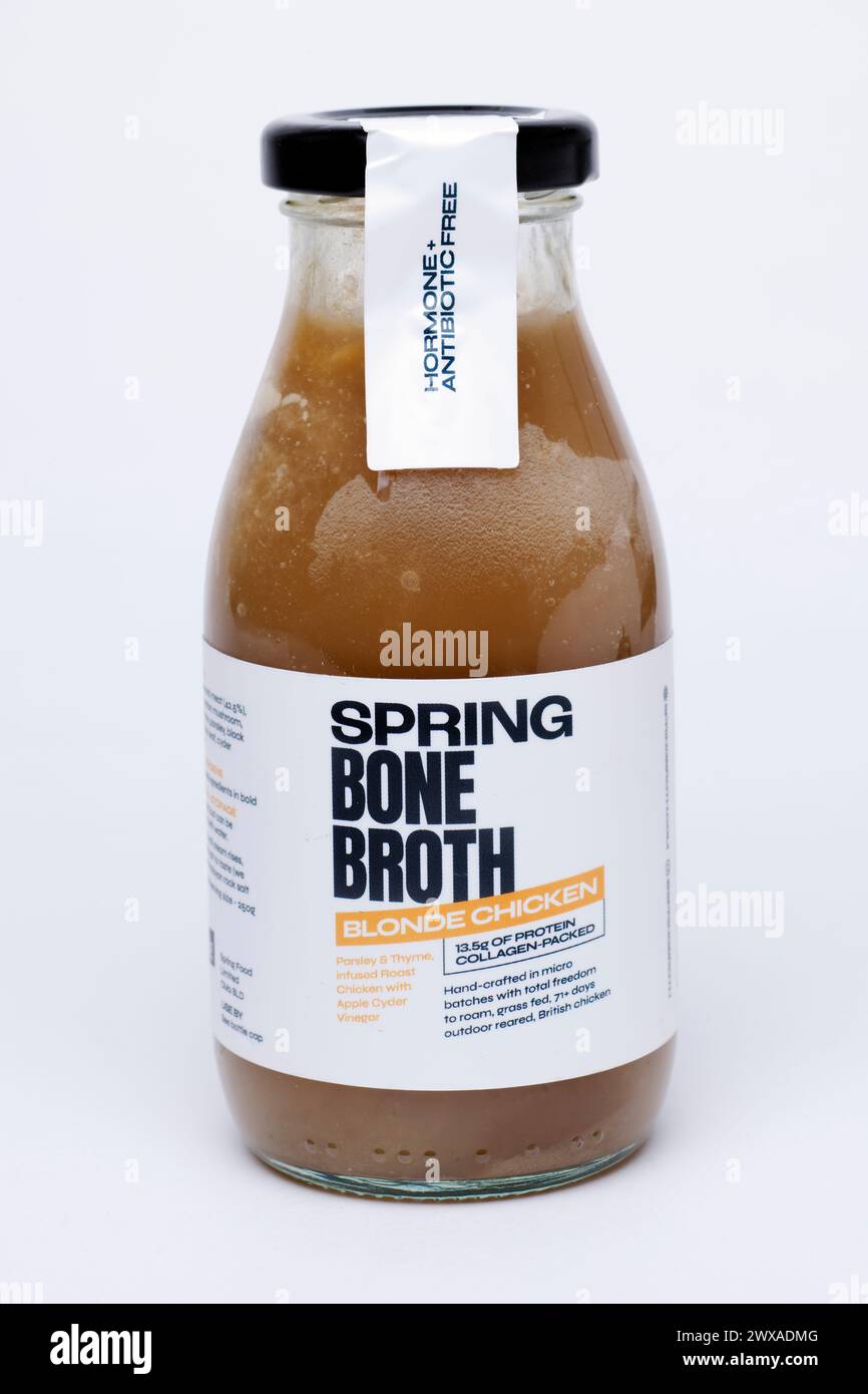 Bottle of Spring Blonde Chicken Bone Broth Infused with Apple Cider Vinegar Stock Photo