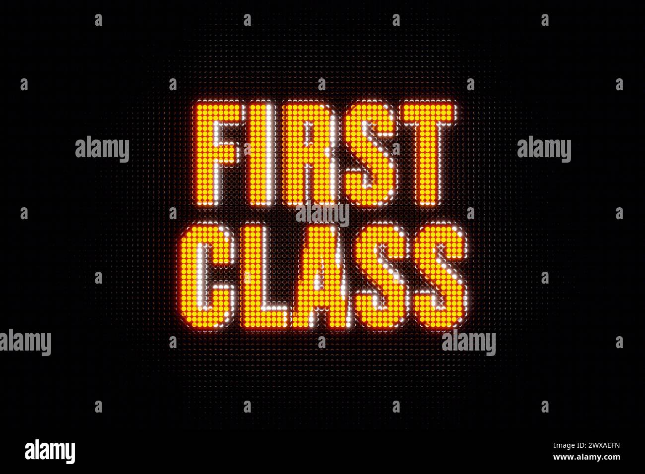 First Class. First Class. Banner in yellow capital letters. The text, bfirst class, illuminated. PRemium, VIP, business lounge, splendid, red carpet, Stock Photo