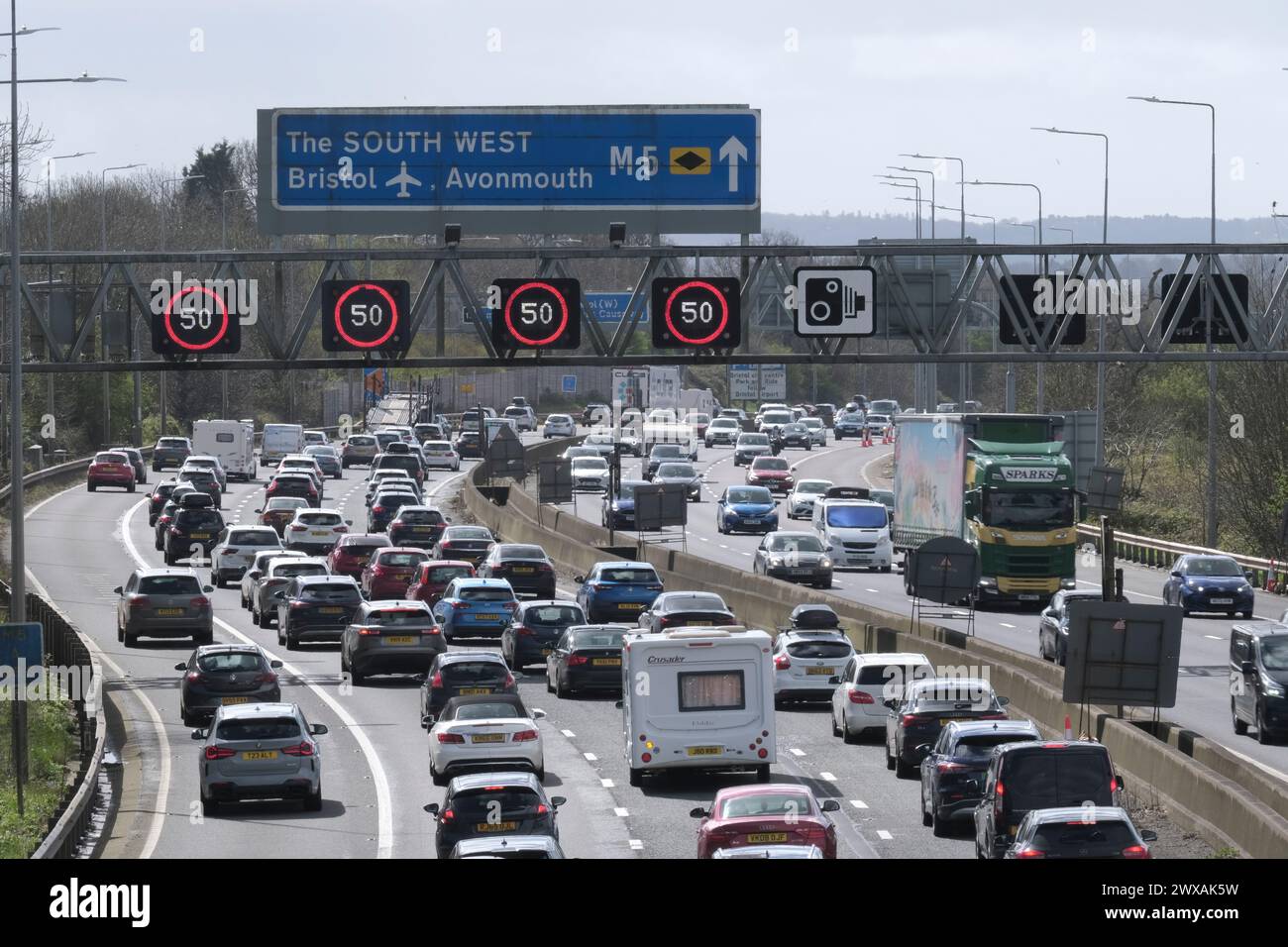 Bristol, UK. 29th Mar, 2024. Easter holiday causes traffic congestion on the M5 between junctions 15/16 and 17. Managed motorway speed restrictions are in place due to the volume of traffic heading south towards Devon and Cornwall. Highways England reports speeds in the low 20's. Credit: JMF News/Alamy Live News Stock Photo