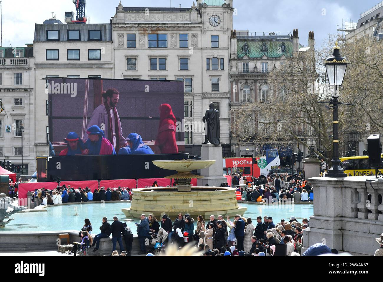 Westminster, London, UK, 29th March 2024. Crowds gather for Passion Play performance in Trafalgar Square on Good Friday as Christians celebrate Easter. Paul Biggins/Alamy Live News Stock Photo