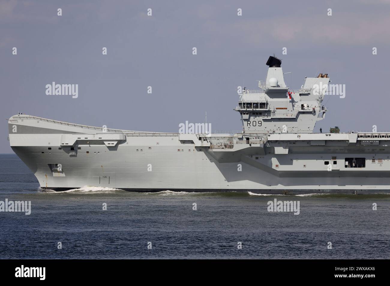 The British aircraft carrier HMS Prince of Wales R09 leaves the port of Rotterdam on March 25, 2024. Stock Photo