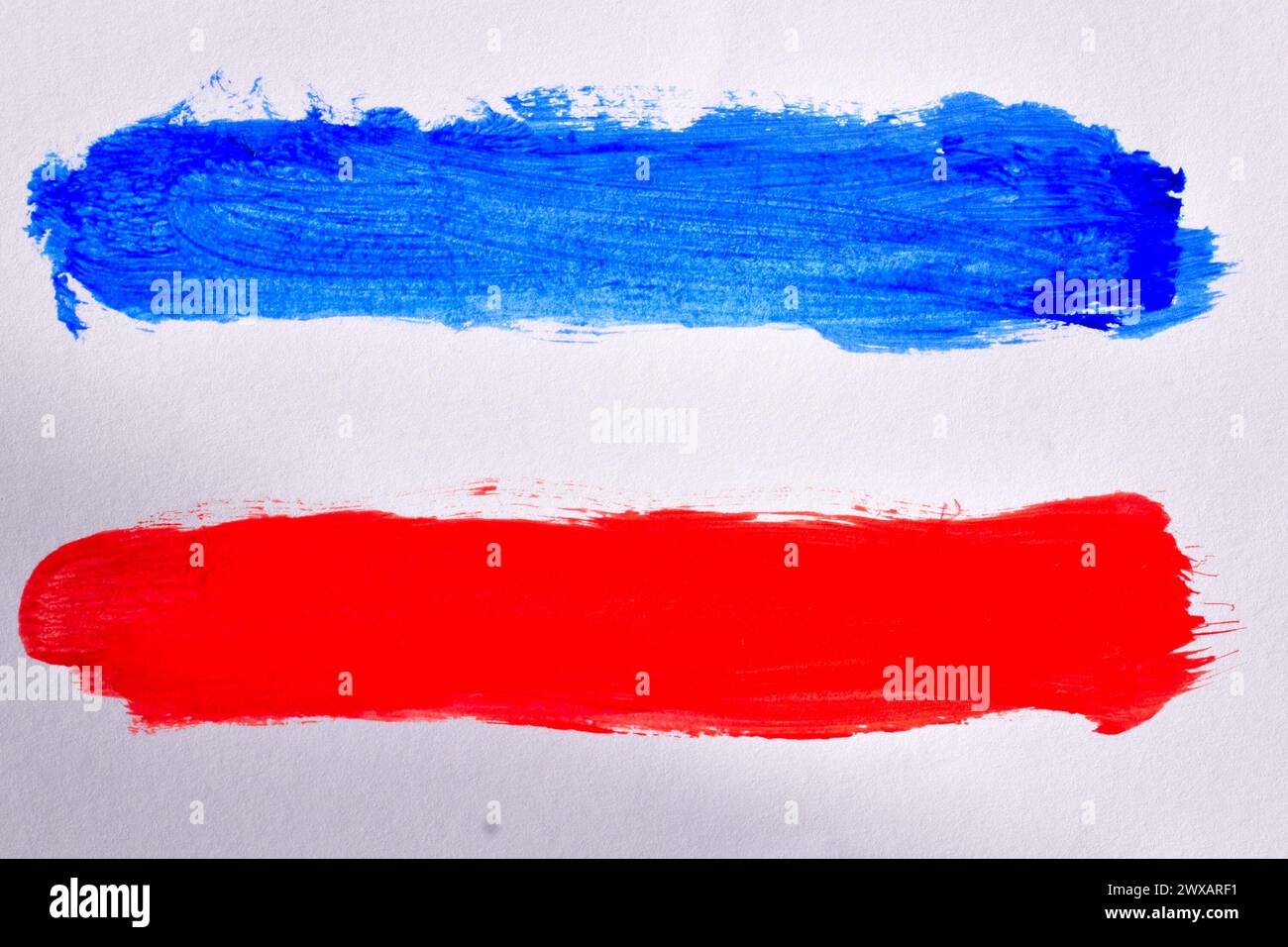 White, blue and red lines painted with watercolors on a white background similar to the flag of Serbia and Montenegro. Stock Photo