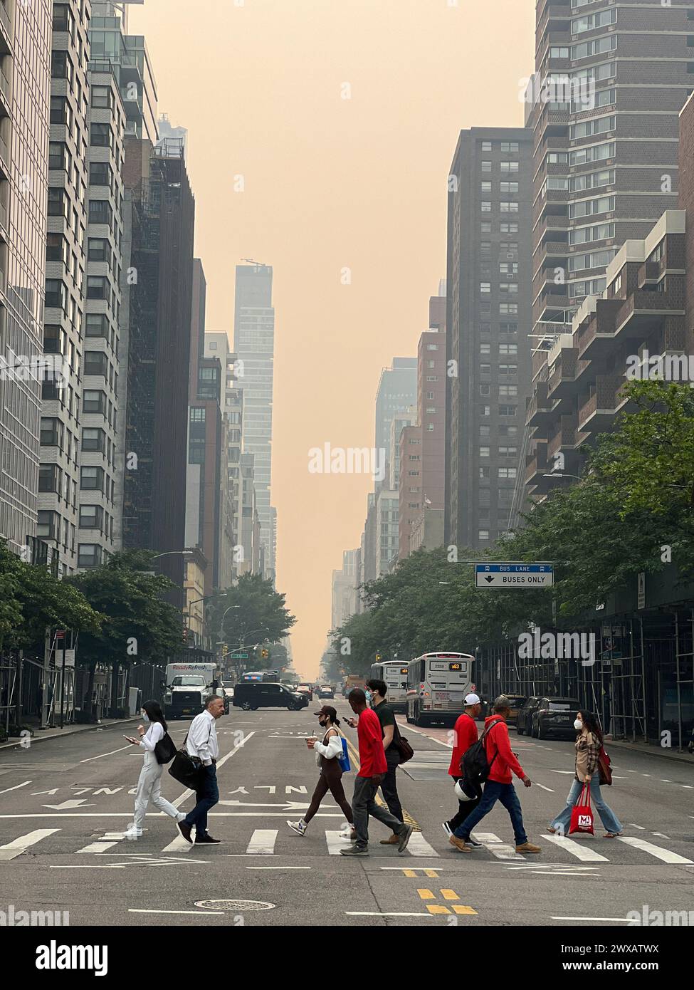 View of Midtown Manhattan covered by the smoke caused by Canadian wildfires, a period of dangerous air quality in New York City Stock Photo