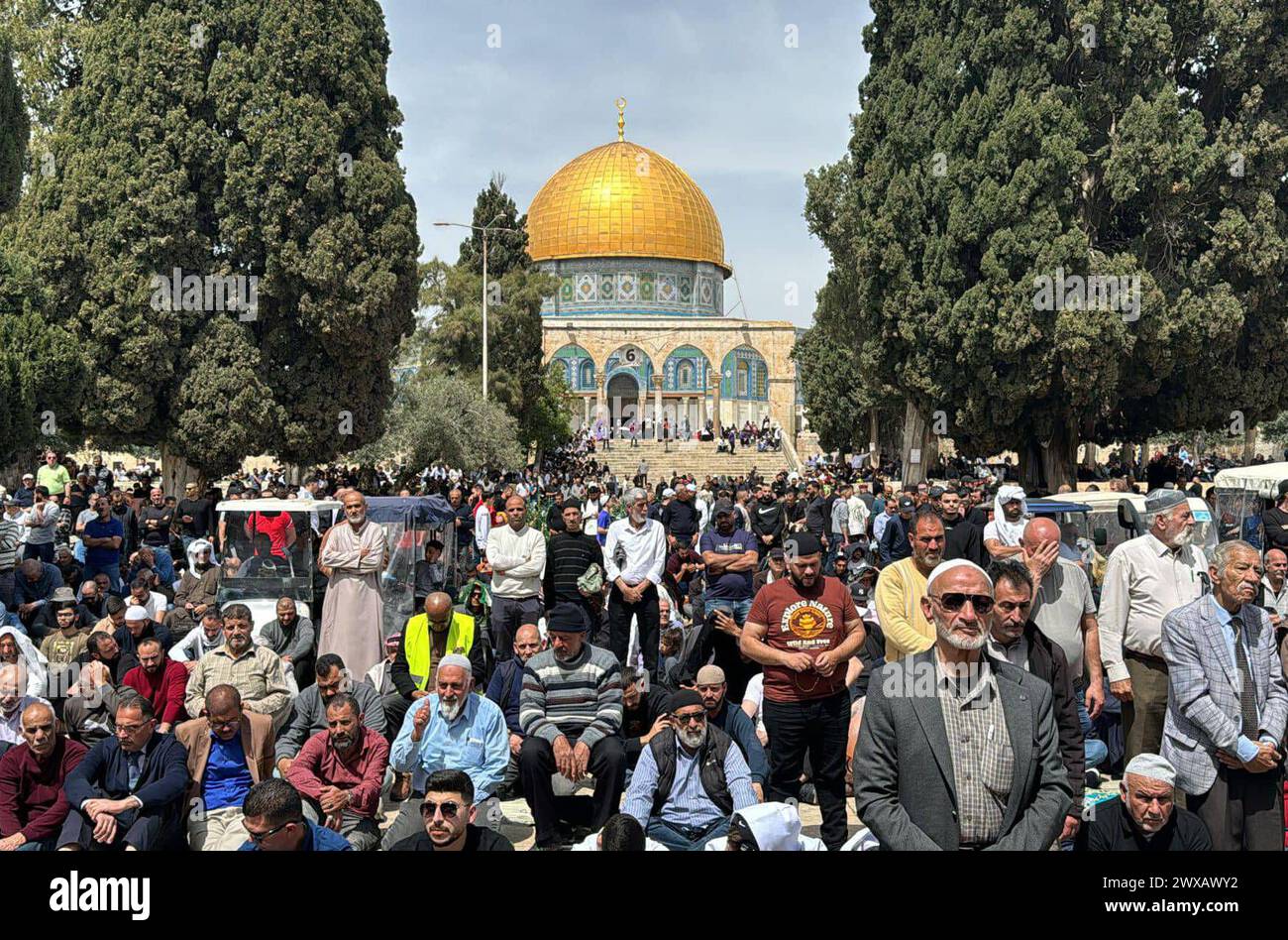 Muslims perform the third Friday prayer of the Holy month of Ramadan at ...
