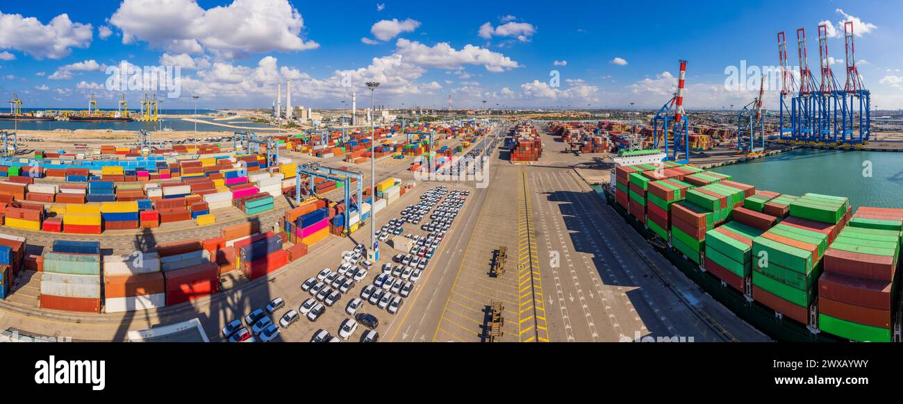 Shipping containers, Cargo Ship  And New Imported Cars in Port facilities in Ashdod, Israel, Containers before Loading In Ashdod Ports. Israel   Panor Stock Photo