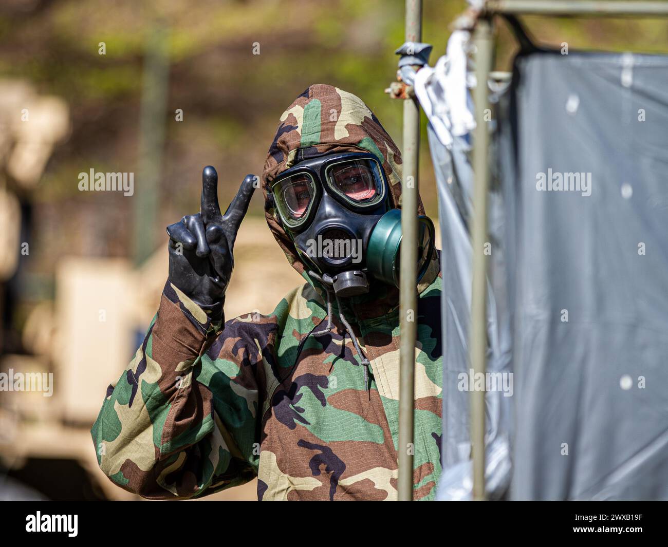Soldier wearing hazmat suit hi-res stock photography and images - Alamy, image size:1300x1065