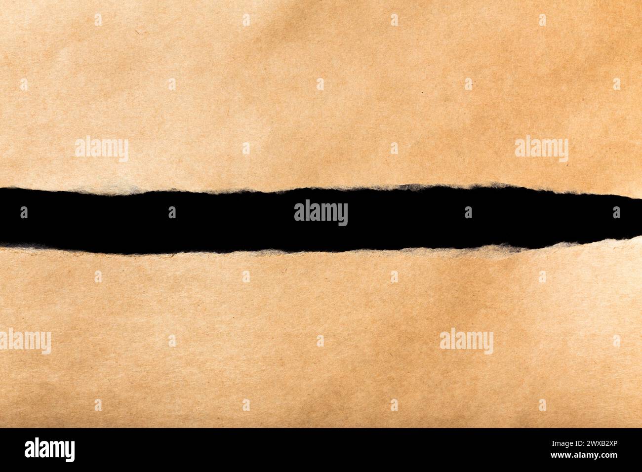 paper torn off on black background Stock Photo - Alamy