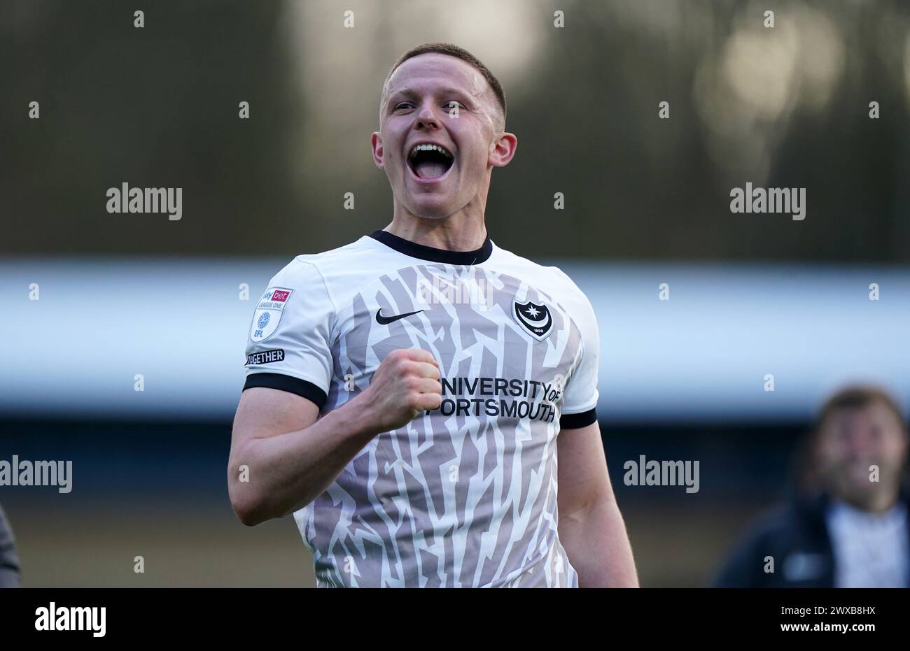 Goalscorer Portsmouth's Colby Bishop celebrates at full time in the Sky Bet League One match at Adams Park, Wycombe. Picture date: Friday March 29, 2024. Stock Photo
