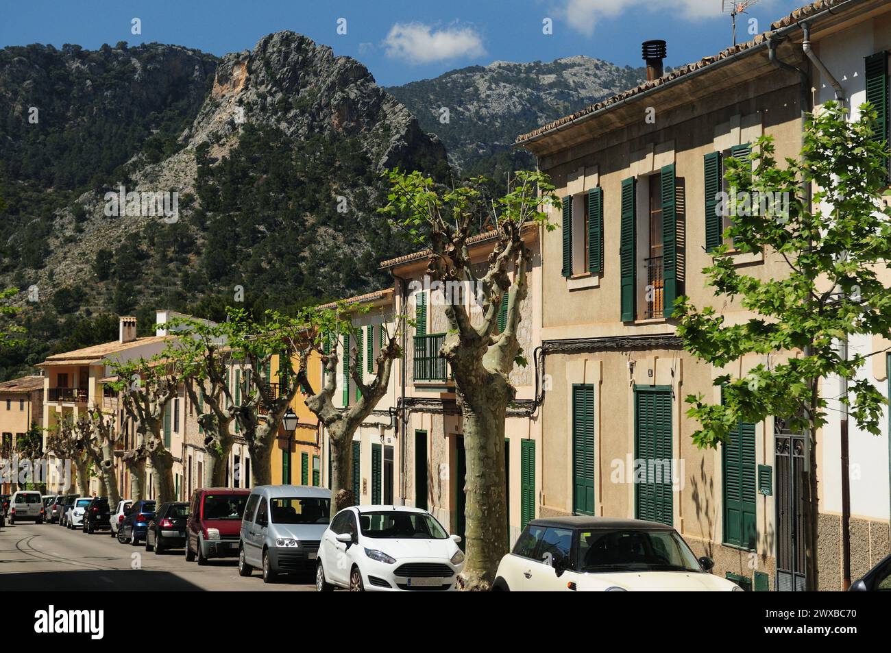 Alley In Bunyola With High Mountains In The Background Mallorca On A Wonderful Sunny Spring Day With A Clear Blue Sky Stock Photo