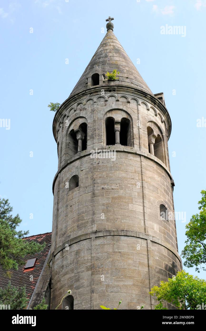 A tall round stone tower with arched windows under a clear sky, Lorch Monastery, Lorch, Baden-Wuerttemberg, Germany Stock Photo