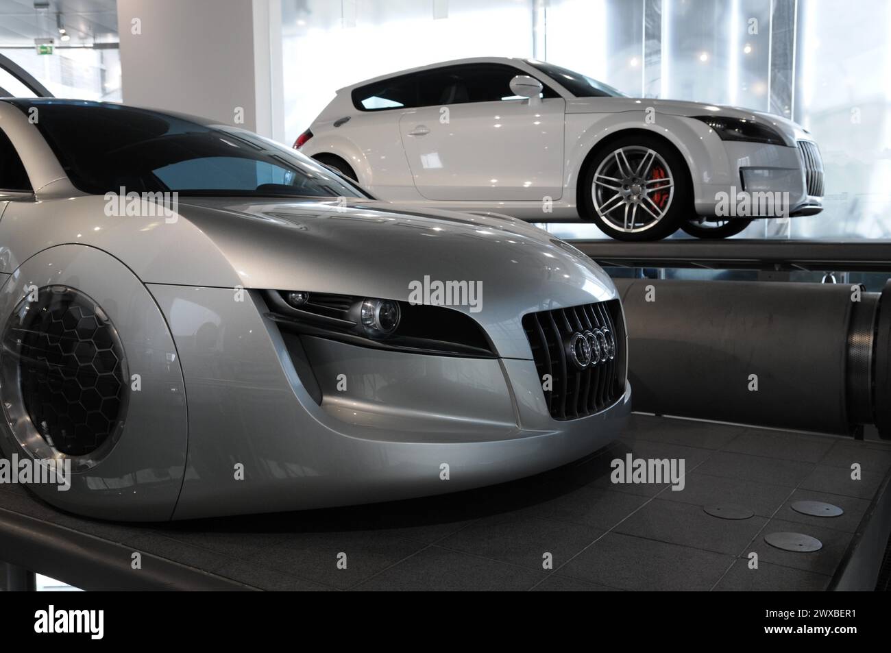 Silver Audi TT Coupe presented in a glass showroom, Museum mobile, Audi Museum, Audi, Ingolstadt, Bavaria, Germany Stock Photo