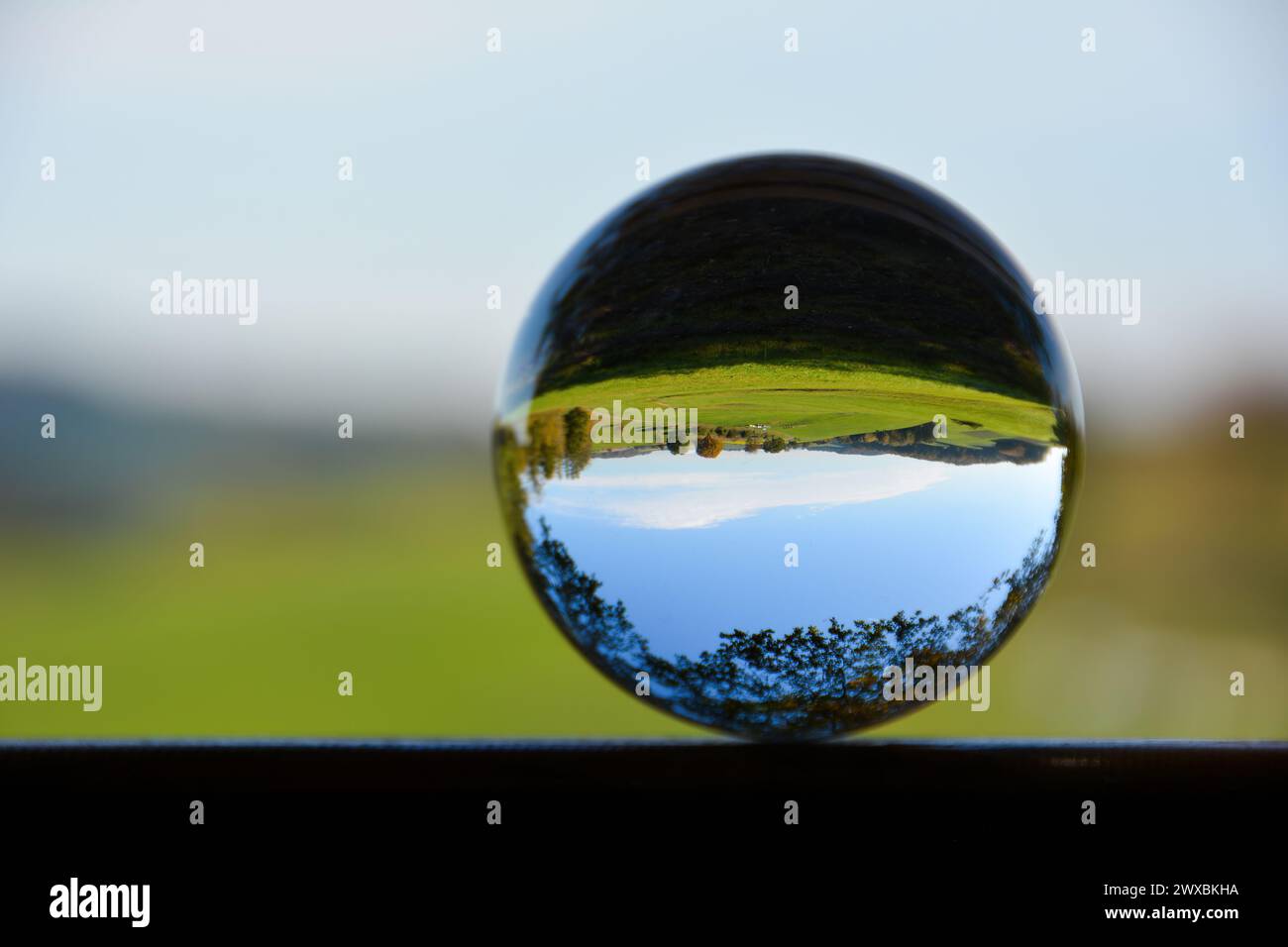 With reflections of a green landscape in the glass hi-res stock ...