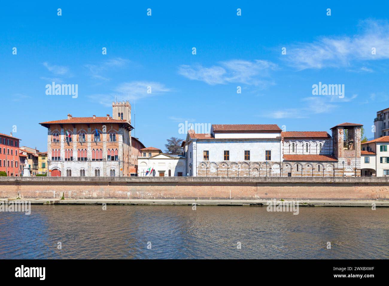 Pisa, Italy - March 31 2019: The Palazzo Vecchio de’ Medici, the National Museum of San Matteo and the Church and convent of San Matteo alongside the Stock Photo