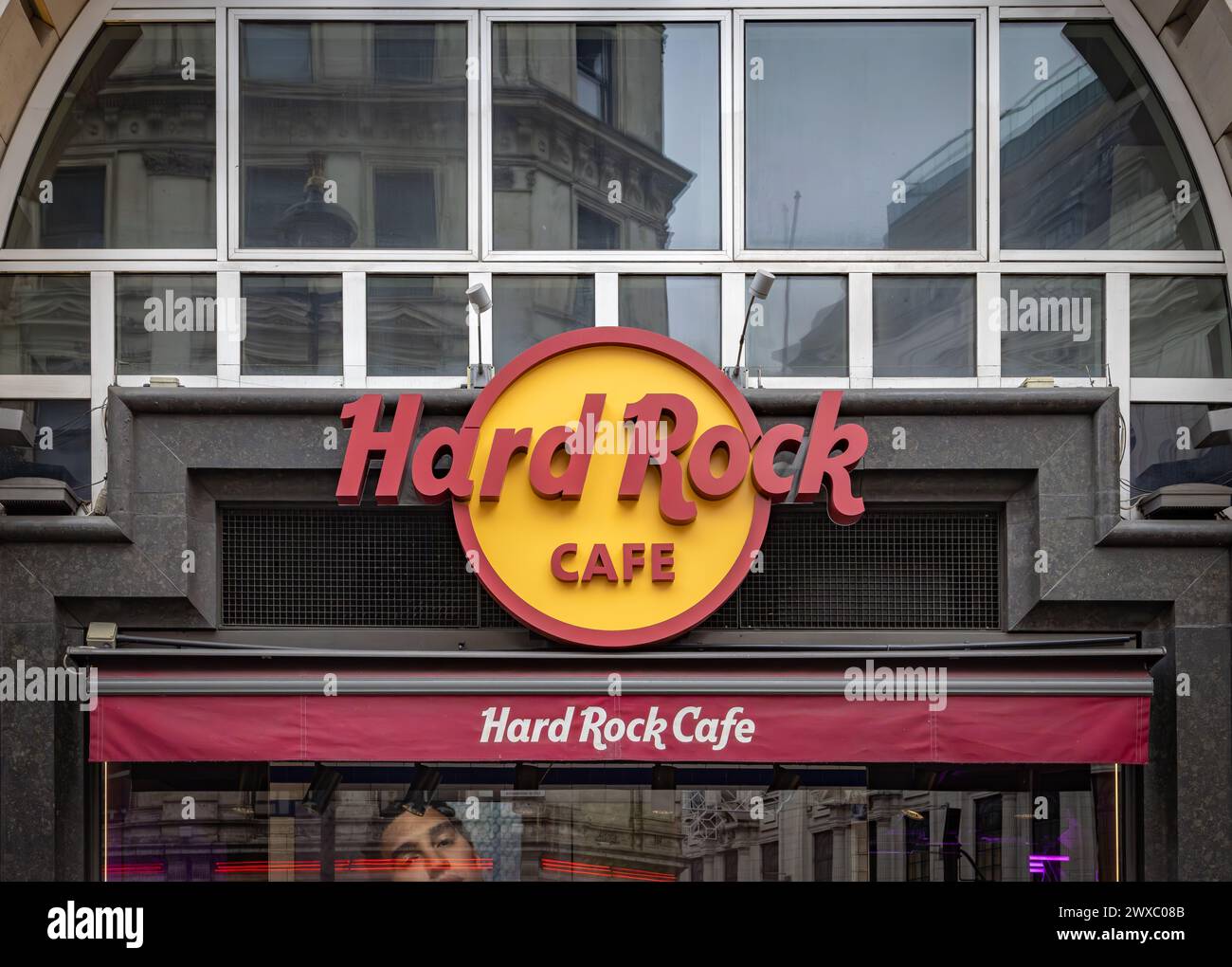 The Hard Rock Cafe in Piccadilly Circus. Iconic logo of the American themed restaurant chain. Eating out in the heart of London's vibrant scene. Stock Photo