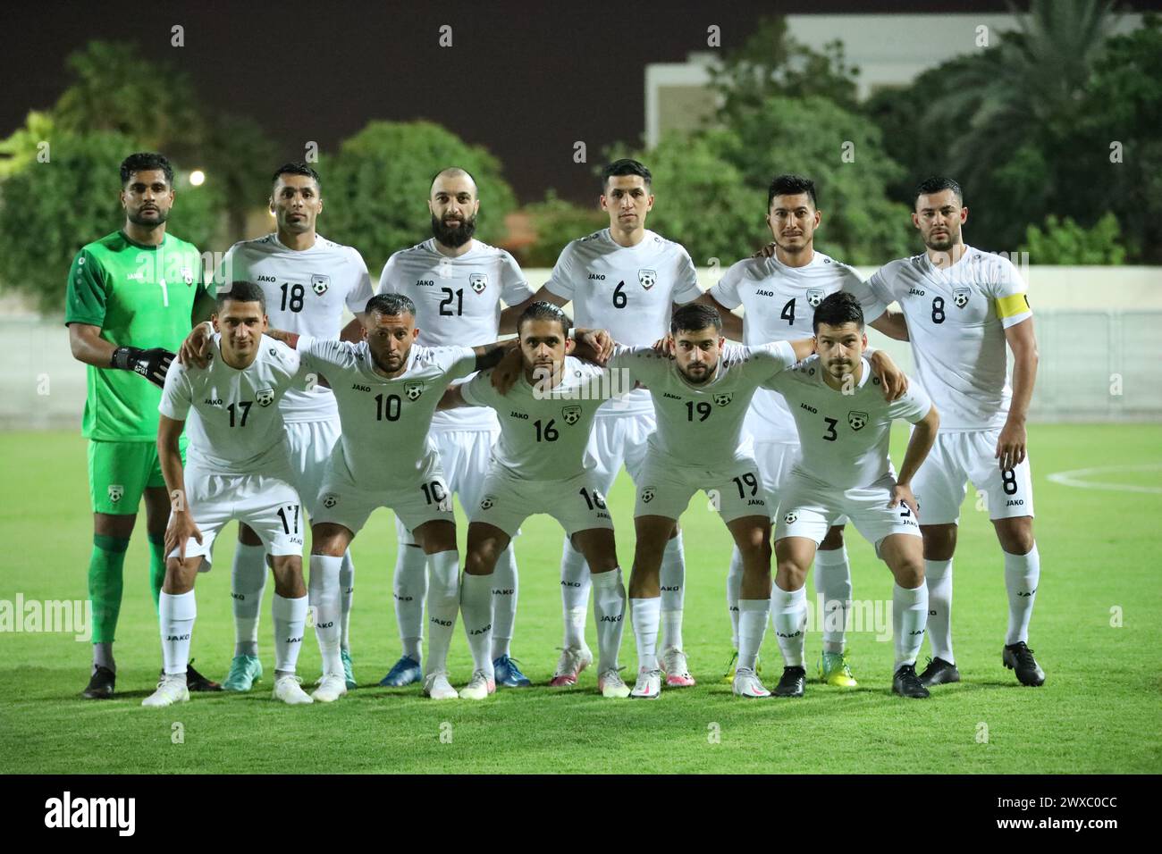 Afghanistan national team pose for a picture during a friendly game against Singapore in Dubai UAE Stock Photo
