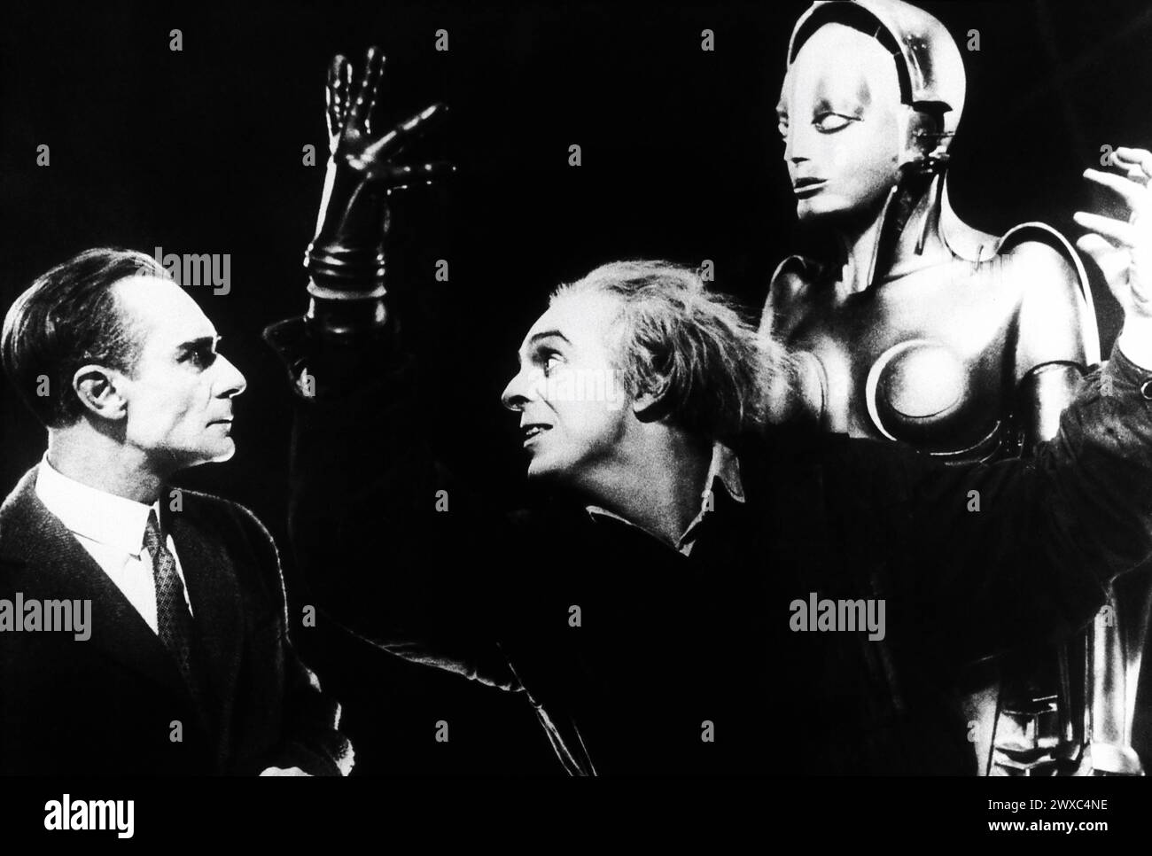 ALFRED ABEL as Fredersen RUDOLF KLEIN-ROGGE as the Inventor and BRIGITTE HELM as the Robot in METROPOLIS 1927 director FRITZ LANG novel and screenplay Thea von Harbou Universum Film (UFA) Stock Photo