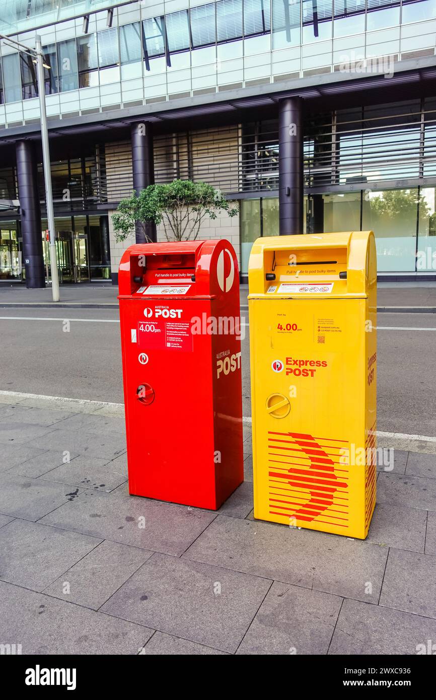 Australian post outdoor red and yellow mail box Stock Photo