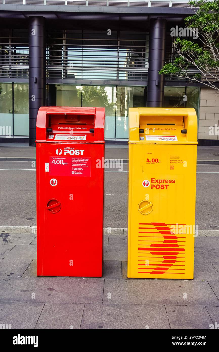 Australian post outdoor red and yellow mail box Stock Photo