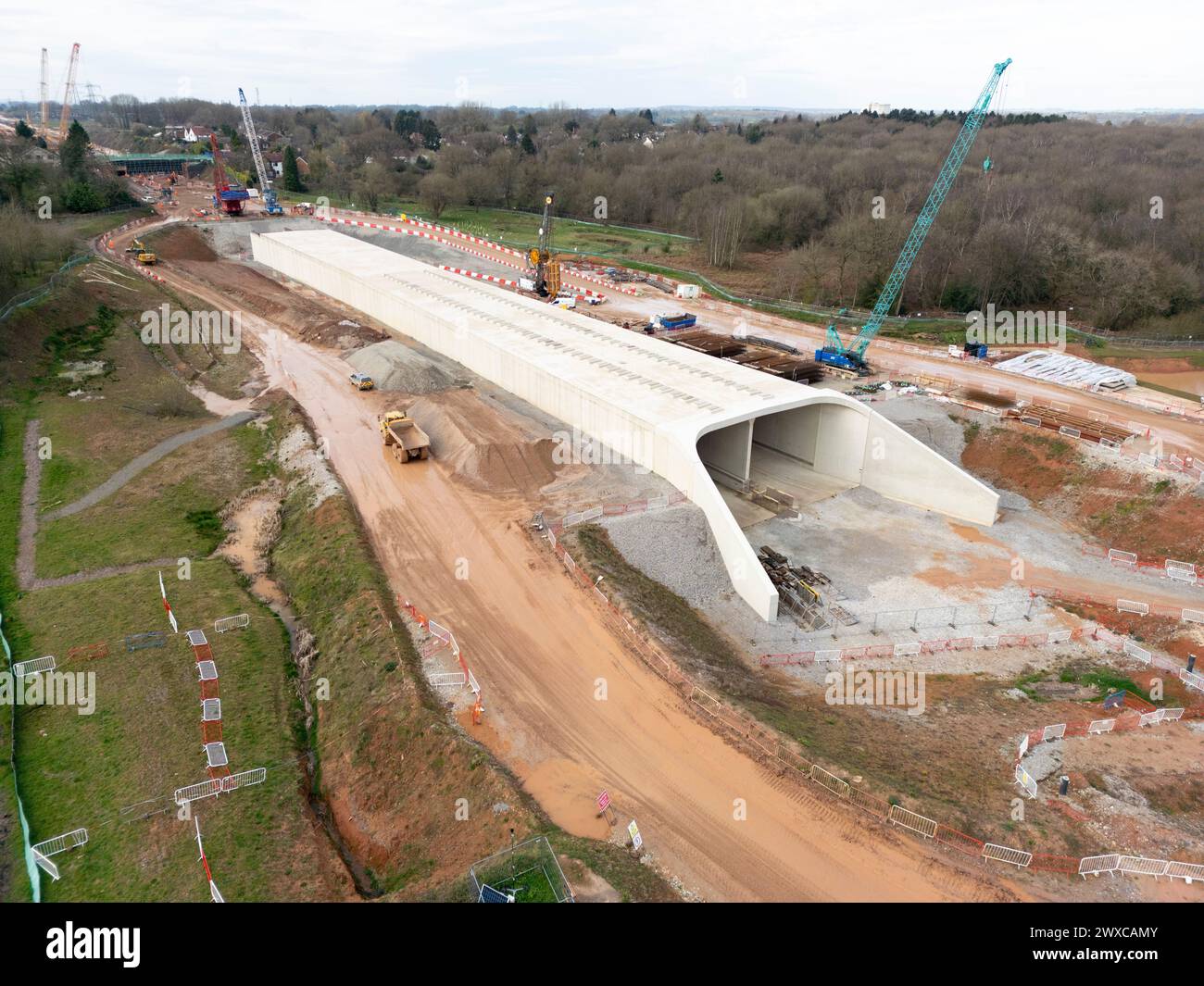 Construction of the 'Cut and Shut' tunnel for HS2 railway that passes through the centre of the village of Burton Green in Warwickshire.The railway will travel through the area in a 700 metre green tunnel, providing an opportunity to create an extensive new landscape over and around the tunnel. New designs, now being shared with the local community, show how the roof of the tunnel will integrate seamlessly with the existing landscape. Stock Photo