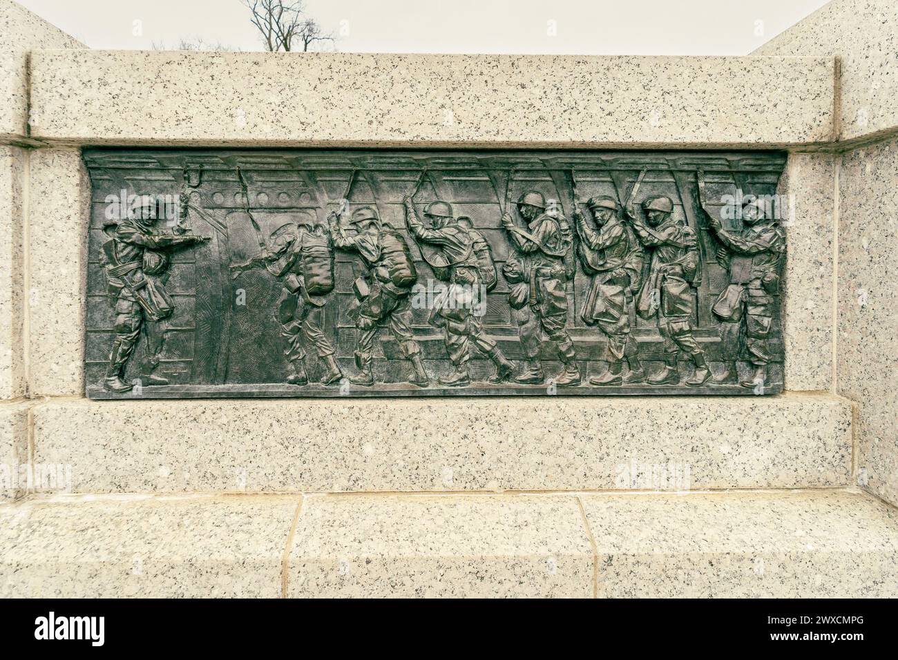 Washington DC – US – Mar 22, 2024 A closeup of one of the bas relief scenes of the war, an element of the World War II Memorial, a national memorial o Stock Photo