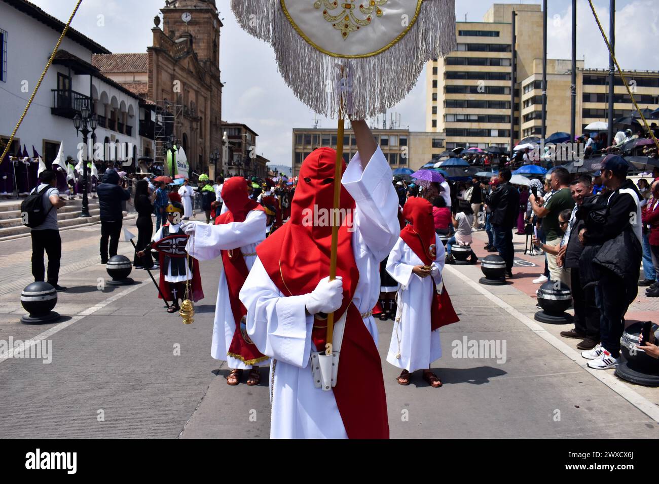 Tunja, Colombia. 29th Mar, 2024. Members of the Nazarene brotherhood and the community take part during the celebrations of the Good Friday in Tunja, Colombia on March 29, 2024. Photo by: Cristian Bayona/Long Visual Press Credit: Long Visual Press/Alamy Live News Stock Photo
