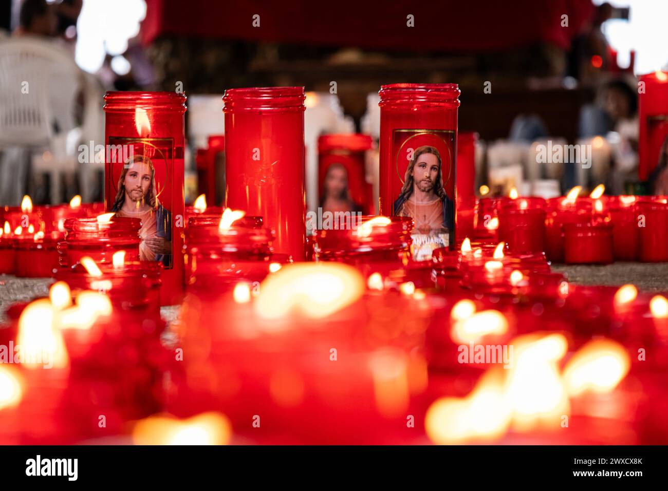 Medellin, Colombia. 29th Mar, 2024. People take part during the Good Friday procession in Copacabana northern of Medellin, Colombia as part of the Holy Week celebrations on March 29, 2024. On days prior to the good friday the 'Cross Sanctuary' suffered a forest fire on its sorroundings leaving marks that the people noticed during the procession. Photo by: Juan J. Eraso/Long Visual Press Credit: Long Visual Press/Alamy Live News Stock Photo