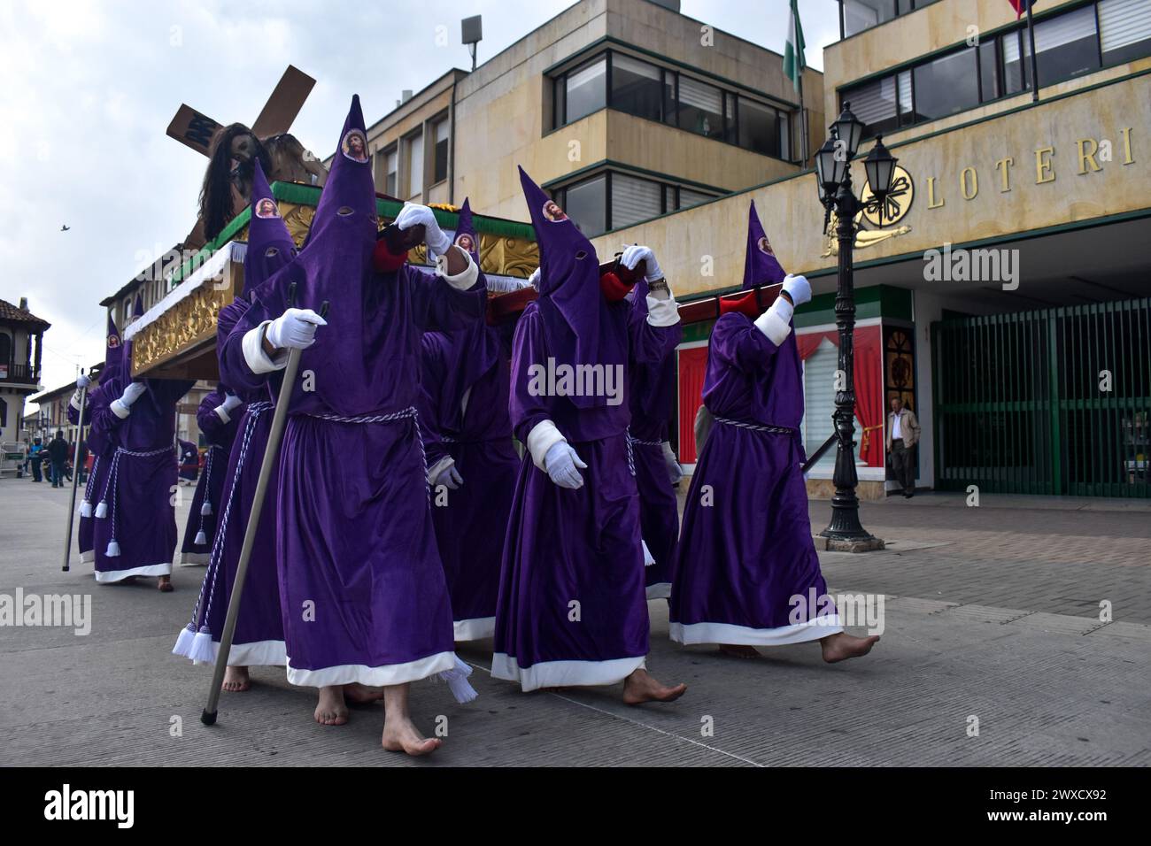 Tunja, Colombia. 29th Mar, 2024. Members of the Nazarene brotherhood and the community take part during the celebrations of the Good Friday in Tunja, Colombia on March 29, 2024. Photo by: Cristian Bayona/Long Visual Press Credit: Long Visual Press/Alamy Live News Stock Photo