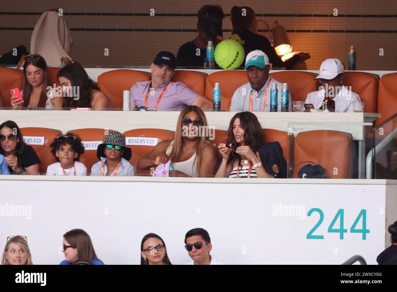 MIAMI GARDENS, FLORIDA - MARCH 29: Serena Williams tries on daughters