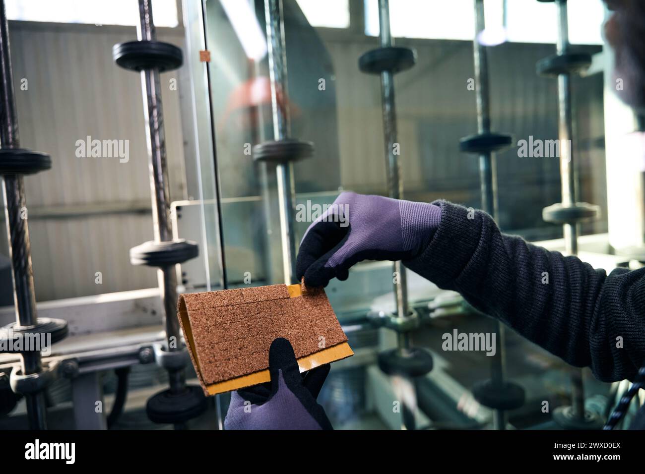 Worker uses special inserts to transport double-glazed windows Stock Photo