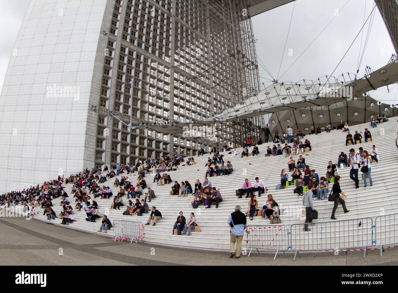 People at the arch at Paris la Défense shot with a fisheye 2011 Stock Photo