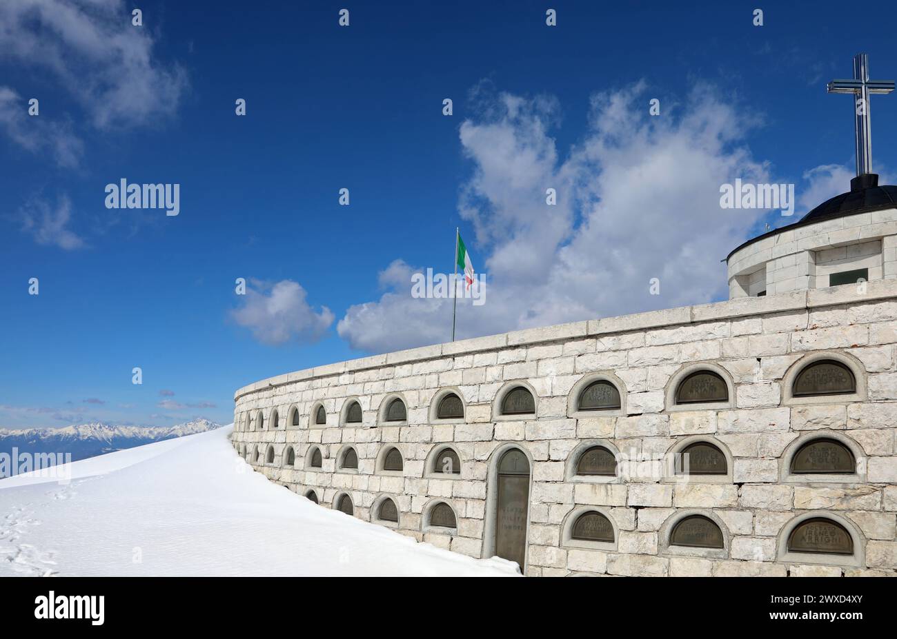 Pieve, TV, Italy - March 13, 2024:Niches of Military Memorial an ossuary of the First World War with snow and italian flag Stock Photo
