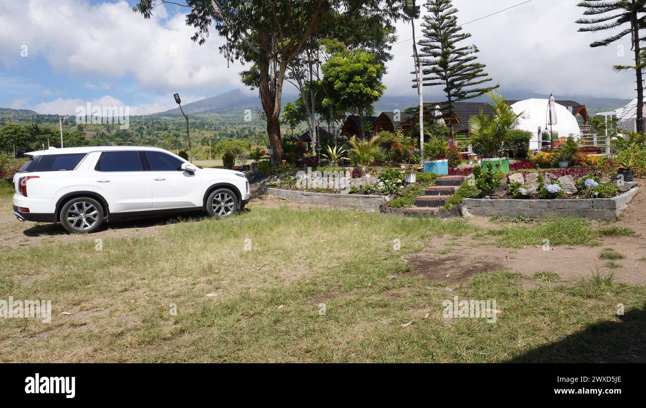 Visitors' car park at an inn near Mount Rinjani in Sembalun Lombok Stock Photo