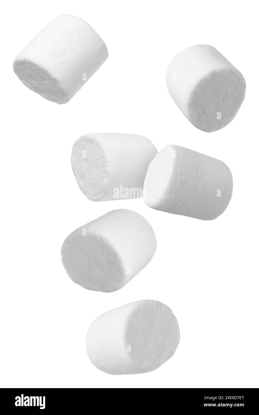 Many yummy marshmallows flying on white background Stock Photo - Alamy