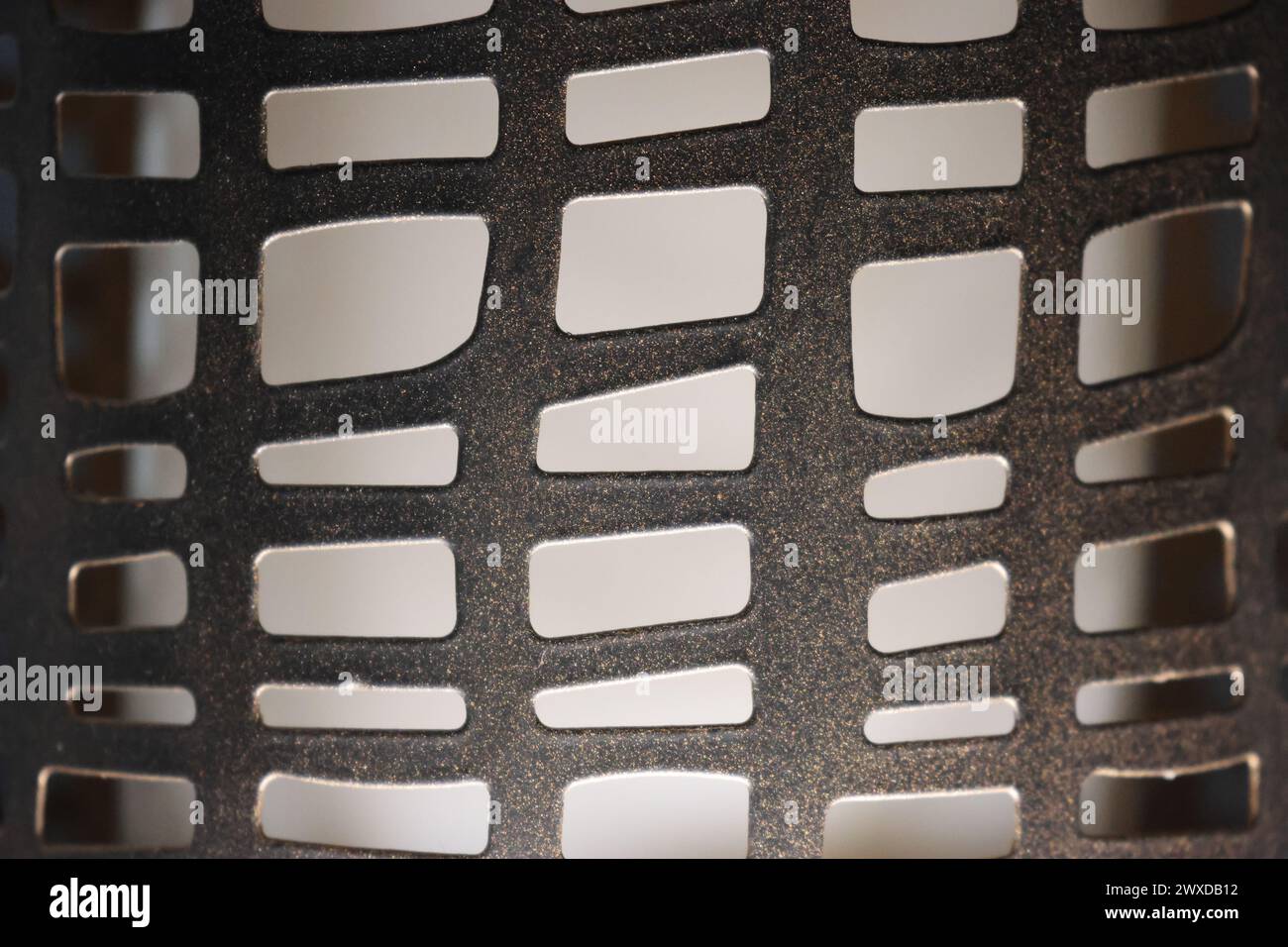 Decorative pattern. Metal net with white backgroun Stock Photo