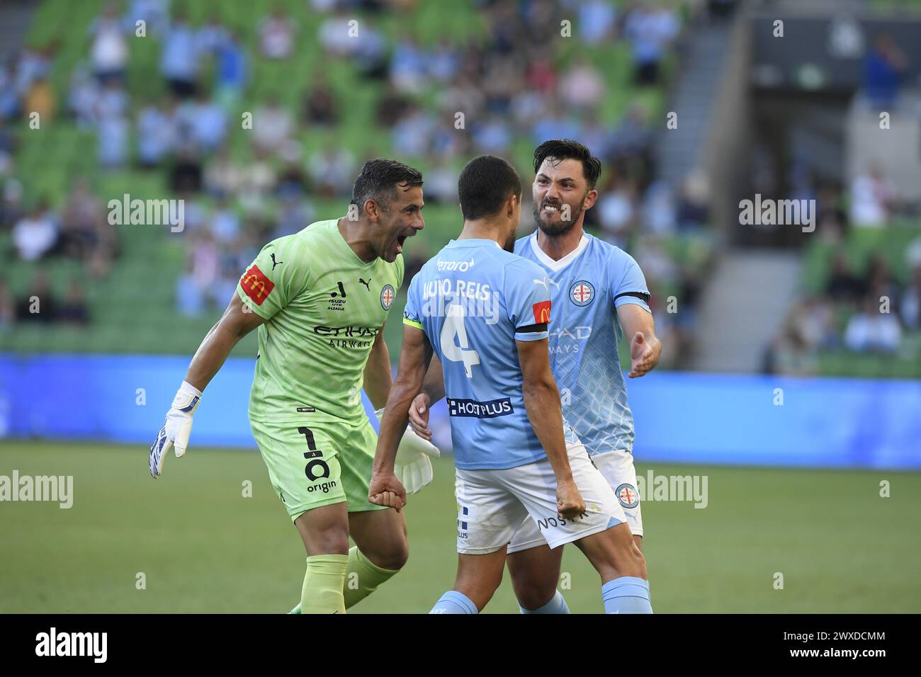MELBOURNE, AUSTRALIA  30 Mar 2024. Melbourne City goalkeeper Englishman Jamie Young(1) (left) and Melbourne City midfielder German Tolgay Arslan(10) celebrate with team mate Melbourne City defender and former Levski Sofia player Nuno Reis of Portugal(4) after he scored, the goal was offside and disallowed during the A League Men Round 22 Melbourne City v Newcastle United Jets at AAMI Park, Melbourne, Australia. Credit: Karl Phillipson/Alamy Live News Stock Photo