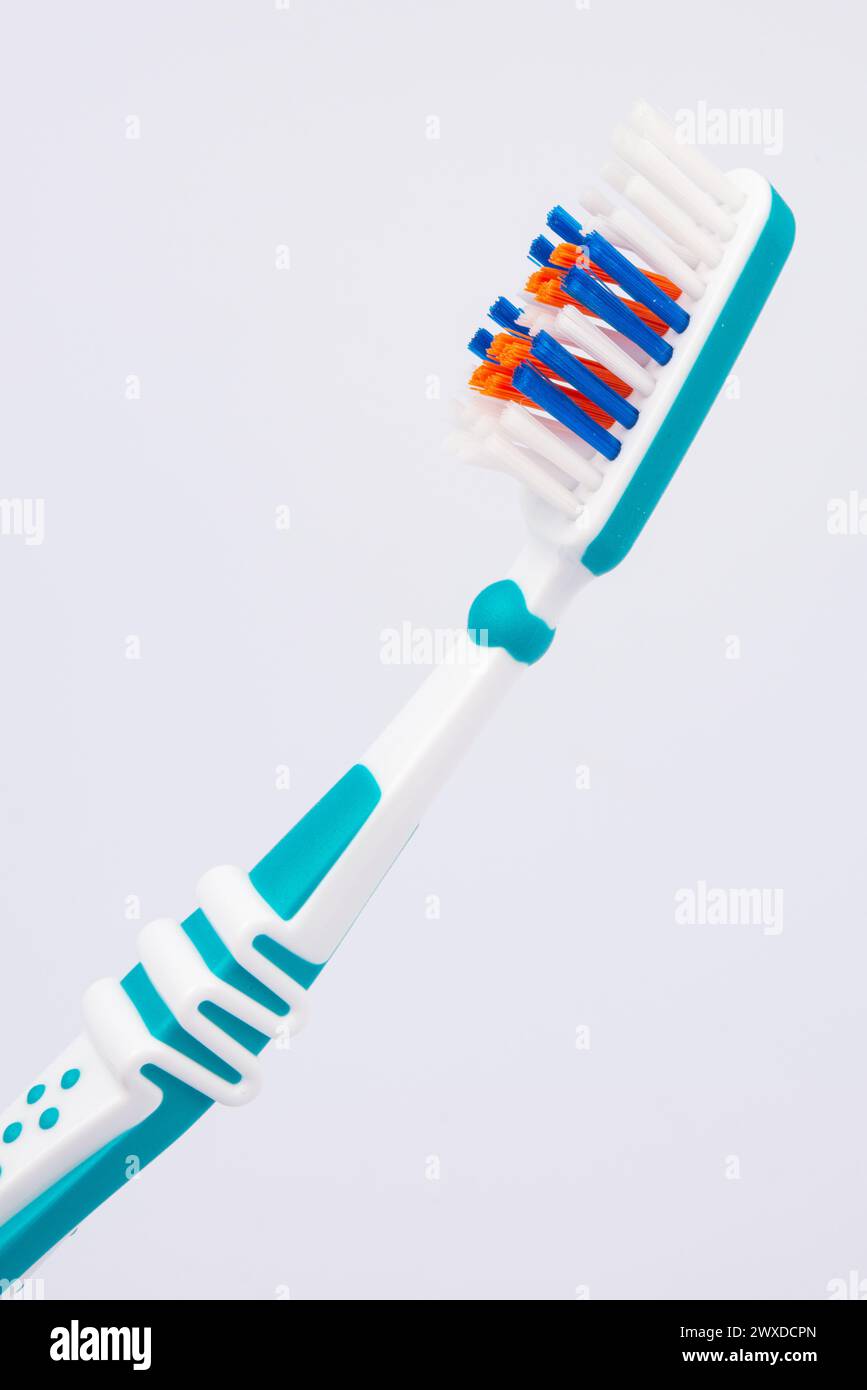Colored toothbrushes. Isolated on white background. Stock Photo