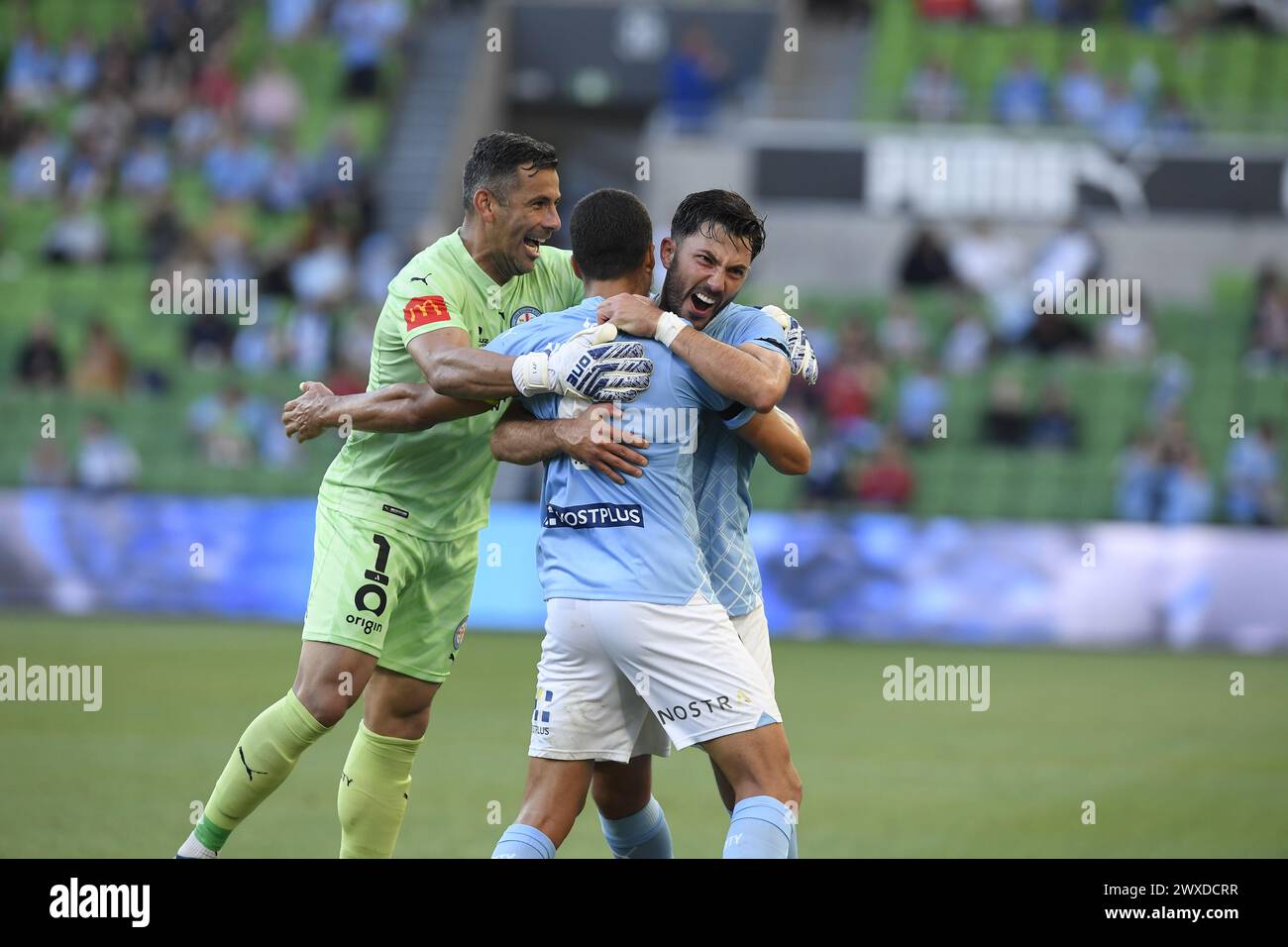 MELBOURNE, AUSTRALIA  30 Mar 2024. Melbourne City goalkeeper Englishman Jamie Young(1) (left) and Melbourne City midfielder German Tolgay Arslan(10) celebrate with team mate Melbourne City defender and former Levski Sofia player Nuno Reis of Portugal(4) after he scored, the goal was offside and disallowed during the A League Men Round 22 Melbourne City v Newcastle United Jets at AAMI Park, Melbourne, Australia. Credit: Karl Phillipson/Alamy Live News Stock Photo