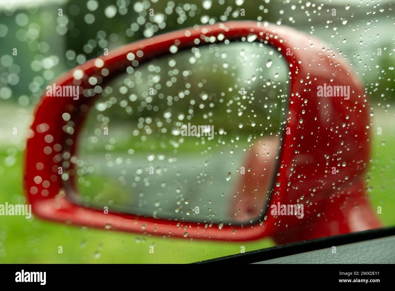 Rear mirror in rain hi-res stock photography and images - Alamy