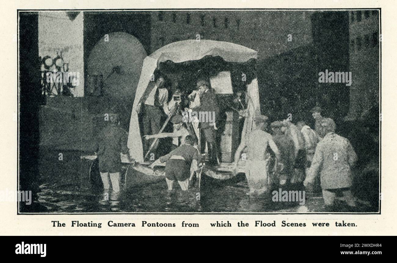Camera Crew including FRITZ LANG at left on the Floating Pontoon for filming of Flood Scenes from page from original release British programme for METROPOLIS 1927 director FRITZ LANG novel and screenplay Thea von Harbou Universum Film (UFA) Stock Photo
